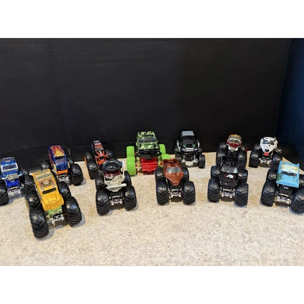 Hot Wheels Monster Trucks Lot of 12 1:64 Wonder Woman Skull Camo Flame Mixed
